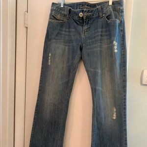 Guess distressed flap pocket jeans
